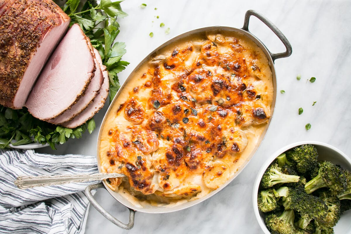 Classic scalloped potatoes in a baking dish.