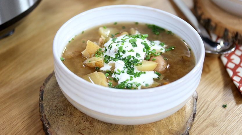 Smoky potato leek soup in a bowl.