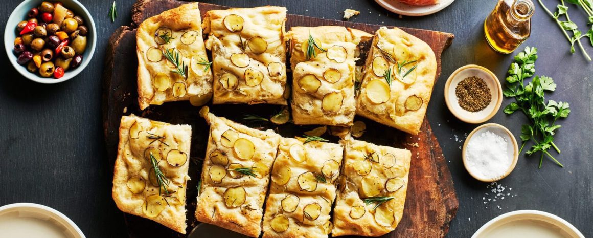 Easy rosemary focaccia cut into nice little squares.