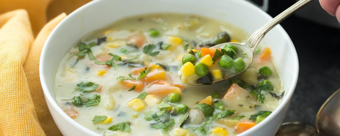 Creamy veggie soup in a bowl.